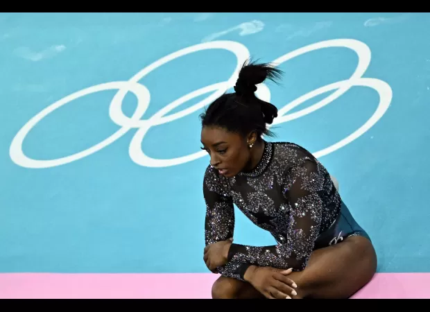 Simone Biles injured during Olympics comeback in Paris.