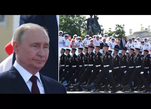 At Russia's Grand Naval Parade, Putin appears to be wishing he were somewhere else.