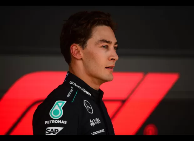 George Russell apologizes for mistake that caused him to be disqualified from Formula One race.