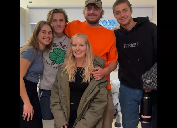 A surfer attacked by a shark shares a joke on social media, asking if something is missing.