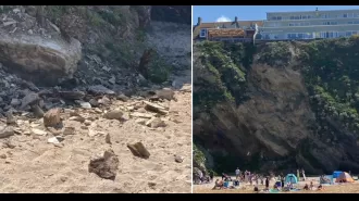 Giant cliff crumbles, nearly hitting sunbathing families.