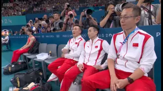 A gymnast from China was separated from his team after making a costly mistake, resulting in them losing the chance for an Olympic gold medal.