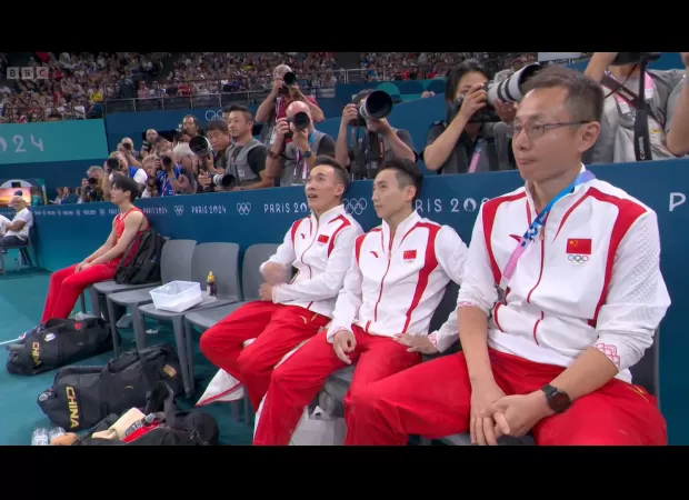 A gymnast from China was separated from his team after making a costly mistake, resulting in them losing the chance for an Olympic gold medal.