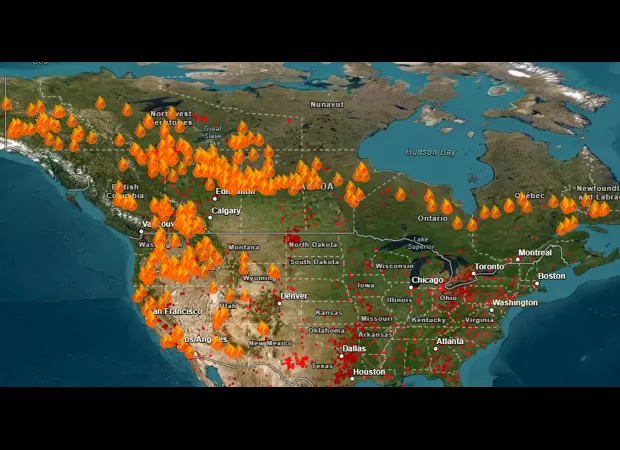 Map displays active wildfires in both US and Canada.