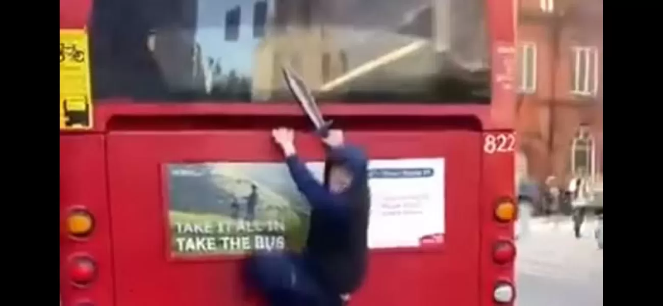 A video with a bus surfer and a knife is causing fear.