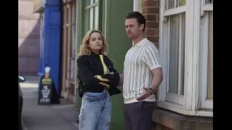 Betsy makes a menacing knife threat towards a disturbed resident of Coronation Street.