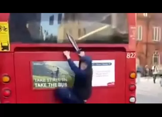 A video with a bus surfer and a knife is causing fear.