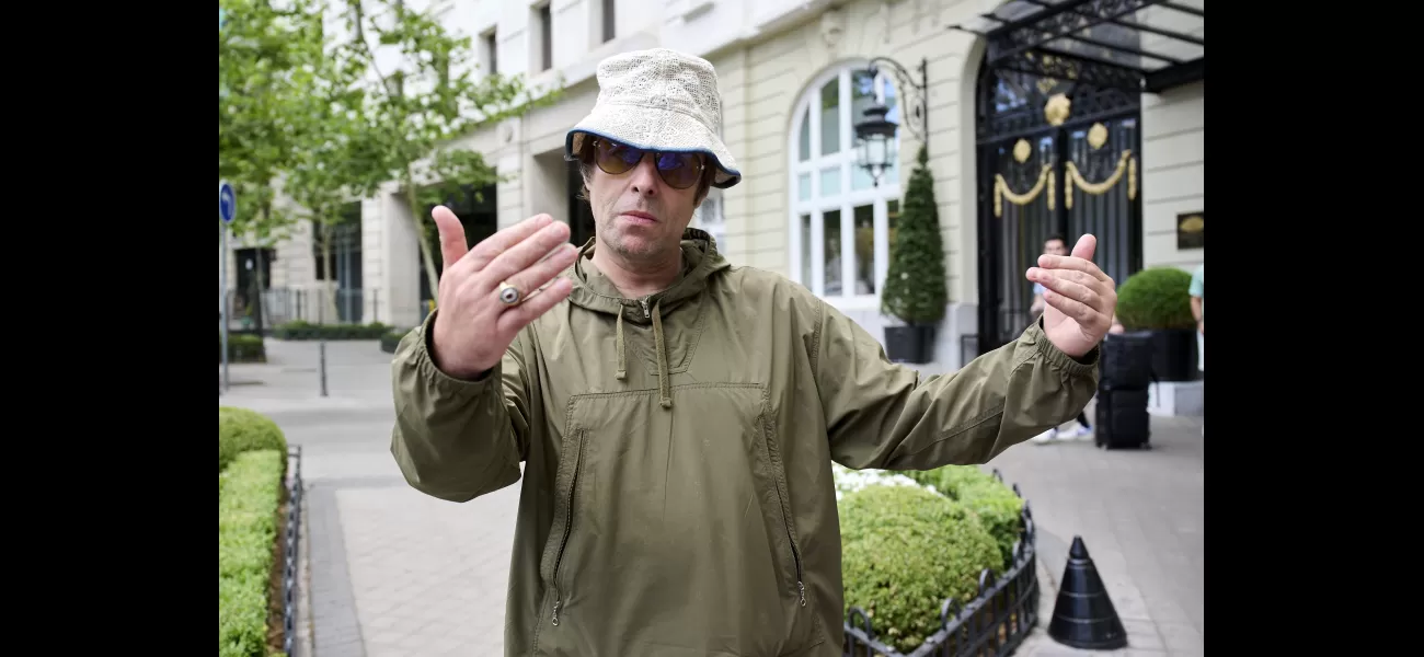 Liam Gallagher criticized for excessive security measures in building large wall.