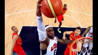 The United States basketball team, led by LeBron James, wins their first game with a flawless dunk from James.