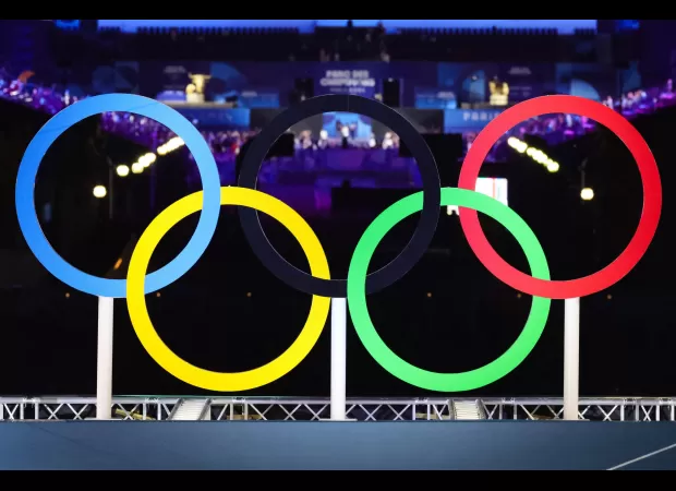 A coach in Paris who assaulted police after celebrating Olympic victory was tasered.