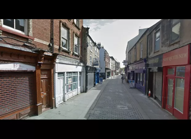 Construction workers uncover remains of infant under floorboards during renovation.