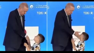 Erdogan, Turkish president, hits kid for not kissing his hand.