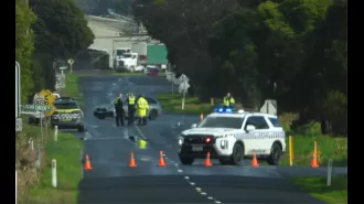 Police detain man after authorities discover dead person on road in eastern Victoria.