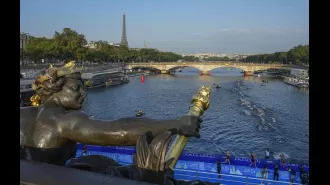 Triathlon in Seine River will proceed despite concerns over water safety.