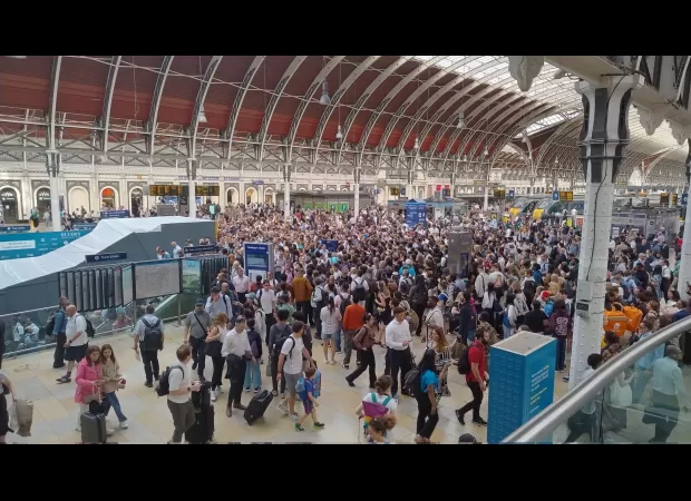 Traffic chaos and flight disruptions at Heathrow due to Tube delays during busy commuting time.
