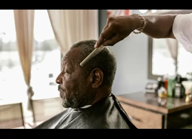 Barbers in Atlanta provide haircuts to the homeless population.