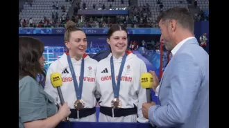 Fred interrupts daughter's BBC interview after winning Olympic medal.