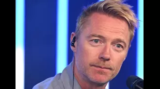 Ronan Keating struggles to hold it together while singing a heartfelt 2000s song during his last radio broadcast.