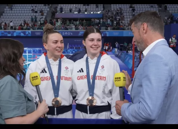 Fred interrupts daughter's BBC interview after winning Olympic medal.