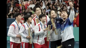 A striking podium selfie with athletes from North and South Korea explained.