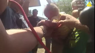 A young child in the US was saved in a complex procedure after becoming trapped inside a PVC pipe.