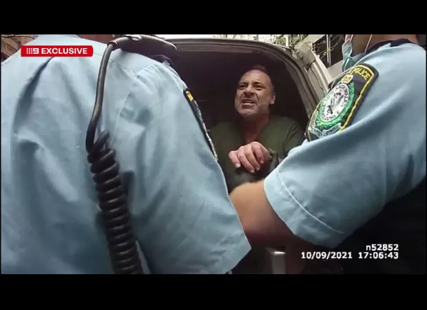 A video from 2021 shows a former TV personality displaying anger during their arrest.