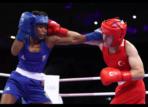 Why do female Olympic boxers wear headgear while males do not?