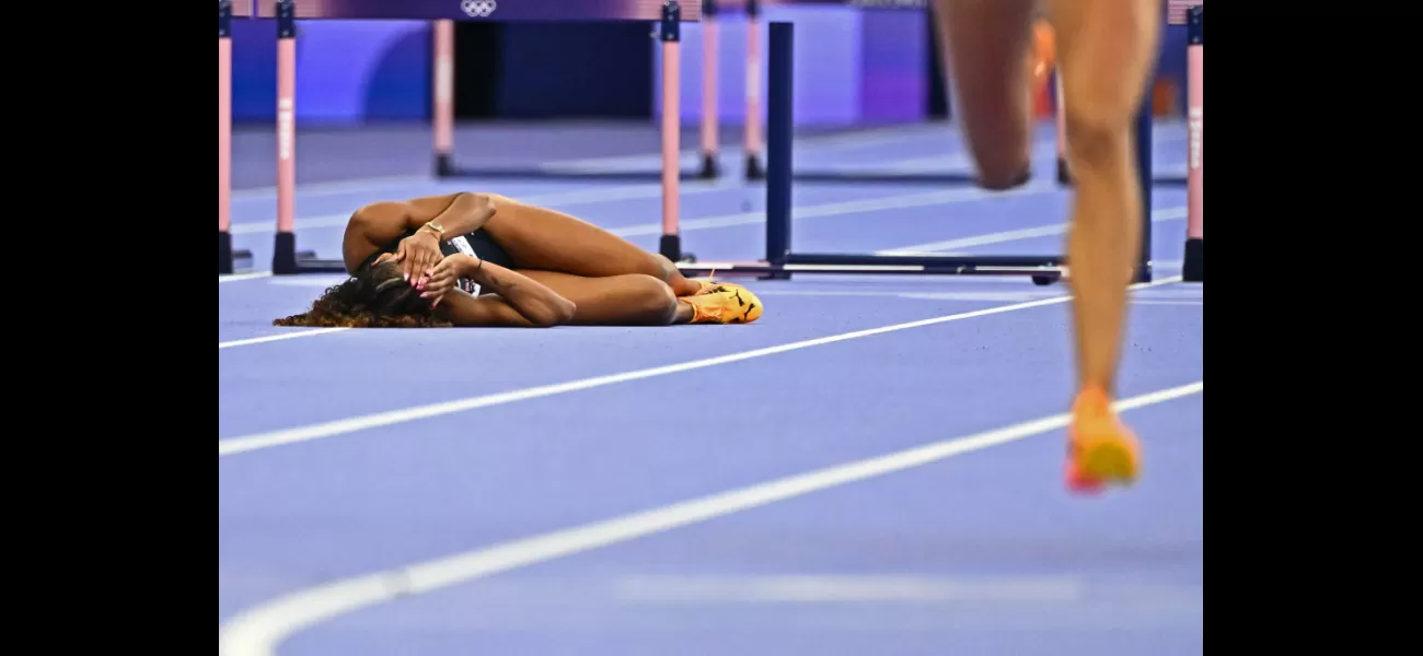 Lina Nielsen, devastated after falling in 400m hurdles at Olympics, receives comfort from reporter.