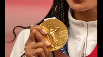 The 2024 Olympic Gold Medal's worth is determined by its metallic content and symbolic significance.