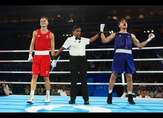 Boxer on Team GB upset by controversial loss in semi-final at Paris Olympics, feeling devastated.