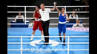 Imane Khelif ecstatic after making it to women's Olympic boxing final.