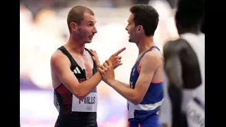 British runner George Mills confronts French opponent after falling in Olympic 5000m event.