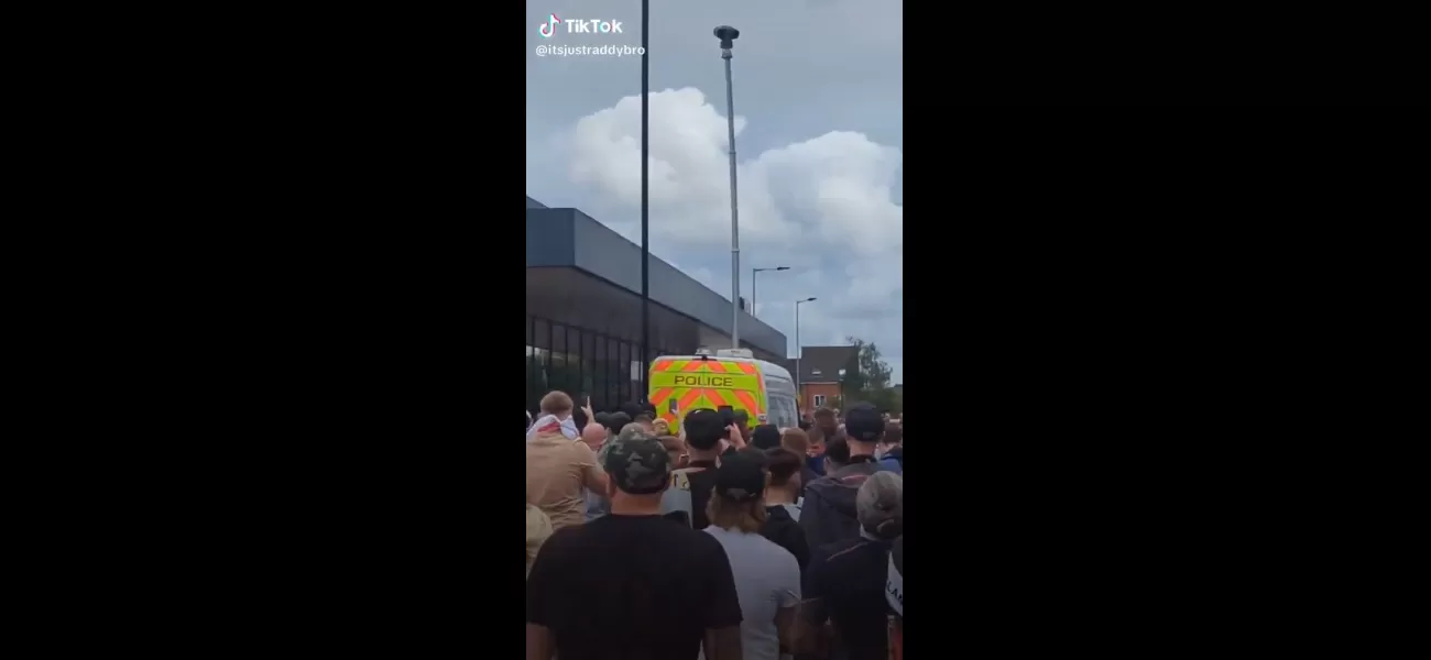 Rioters attacking surveillance camera show no understanding of irony.