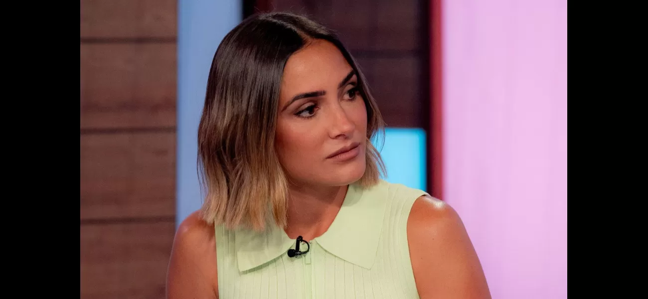 TV host's expression changes as she accuses colleague of giving a negative compliment.