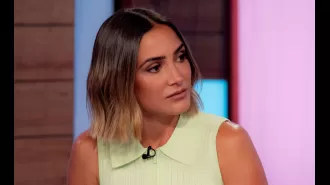 TV host's expression changes as she accuses colleague of giving a negative compliment.