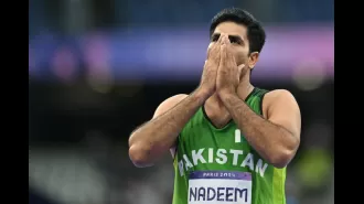 Javelin official stunned by Arshad Nadeem's incredible Olympic record throw, priceless reaction caught on camera.
