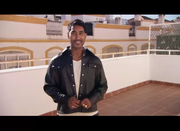 A TV personality from Channel 4 responds boldly to racists who told him to leave the country.