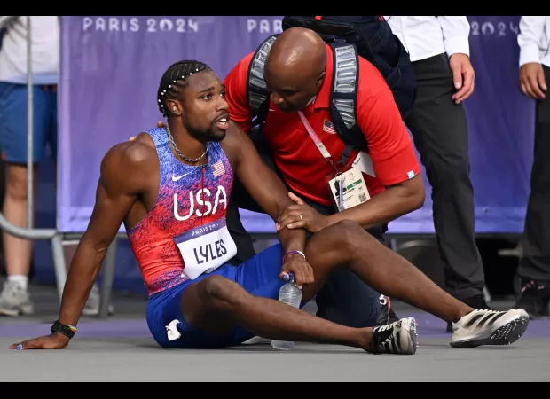 USA sprinter Noah Lyles responds to criticism for competing in Olympic final while positive for Covid.