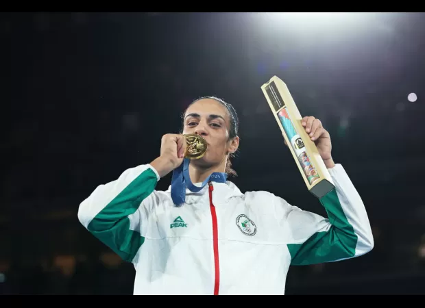 Imane Khelif celebrates groundbreaking boxing gold win with powerful statement of resilience.