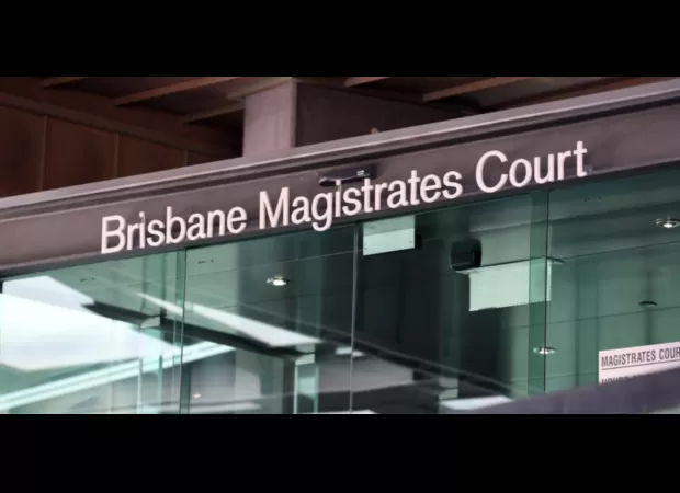 Female accused of trying to kill and set fire to someone in a domestic violence incident.