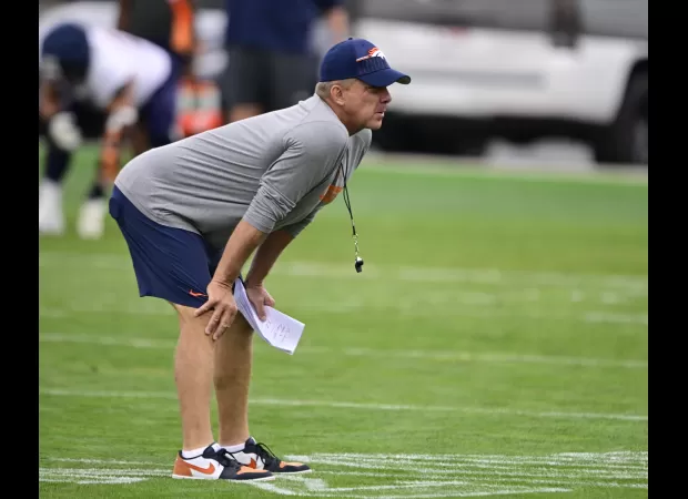 Coach Payton divides players into groups during preseason