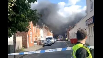 12-year-old boy taken into custody following massive fire that led to evacuation of 250 homes.