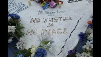 A police officer was severely hurt during a demonstration on the anniversary of Michael Brown's death.