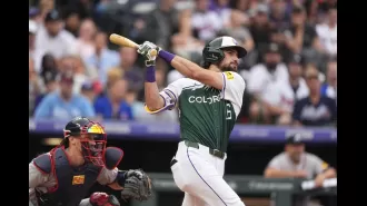 The Rockies were defeated by the Braves in an 11-8 game at Blake Street.