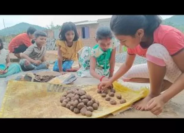 Daringbadi students create seed balls to promote tree planting.