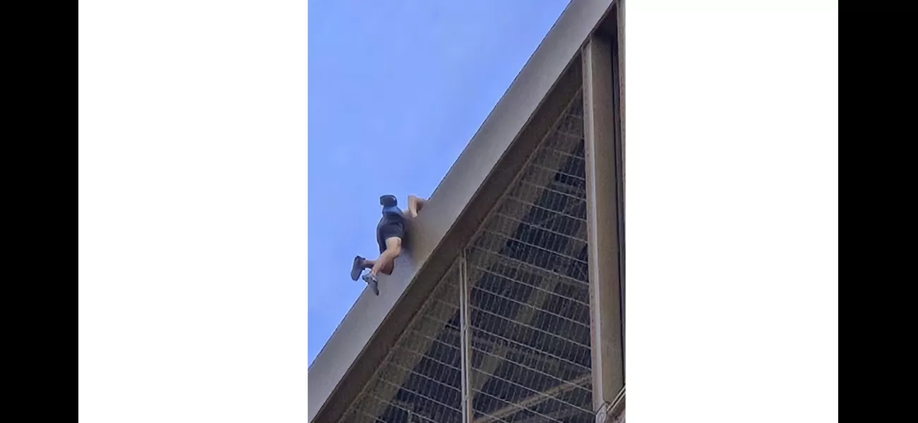 Man detained for scaling Eiffel Tower days before Olympics finale.