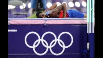 Olympian addresses criticism for not sharing gold medal with competing athlete.