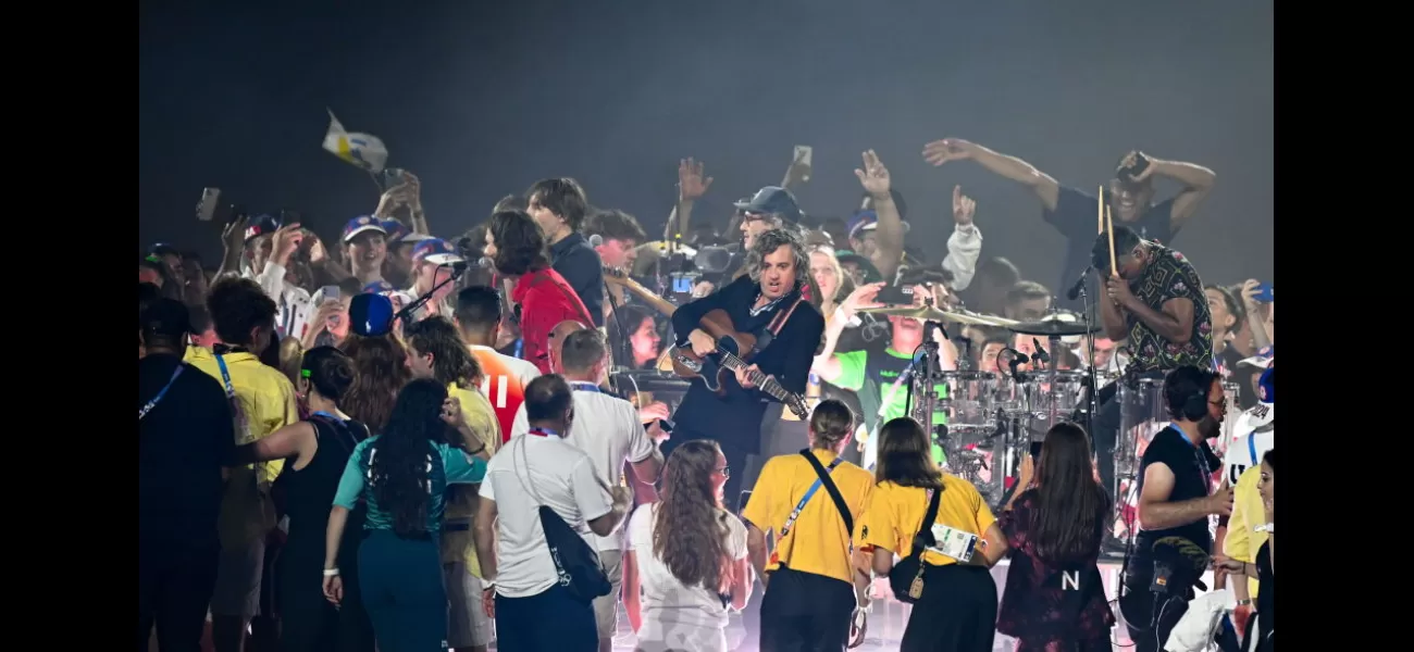 The stadium announcer mistakenly tells Olympians to leave the stage during the closing ceremony, causing an awkward moment.