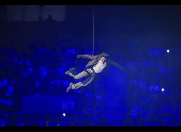 Tom Cruise wows at Olympics closing ceremony with his daring stunts in Mission: Impossible.