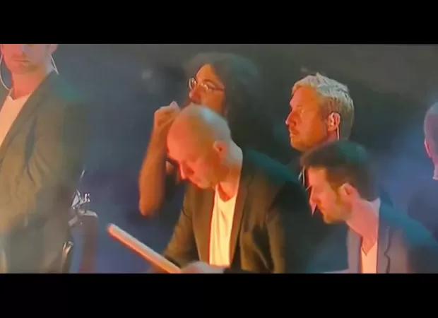 Olympics ceremony star eats noodles on stage, steals show.